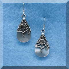 J06. Sterling silver leaf overlay and mother of pearl drop earrings - $18